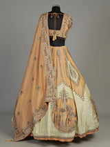 Peach silk lehenga choli with zardosi cap sleeve embellishments