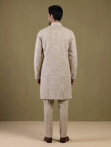 Beige linen kurta suit with floral thread embellishments
