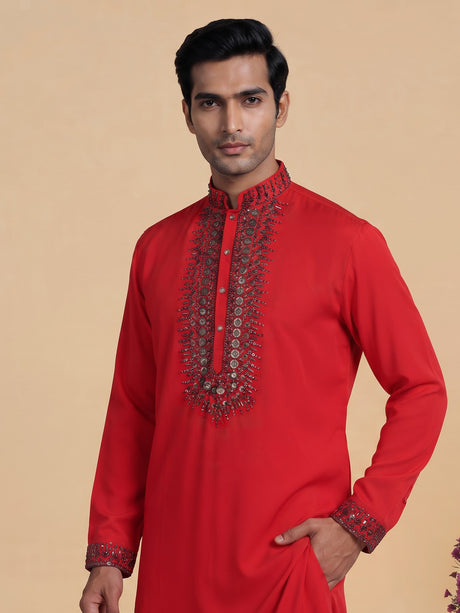 Scarlet red crepe silk kurta suit with antique silver embellished bib