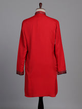 Scarlet red crepe silk kurta suit with antique silver embellished bib