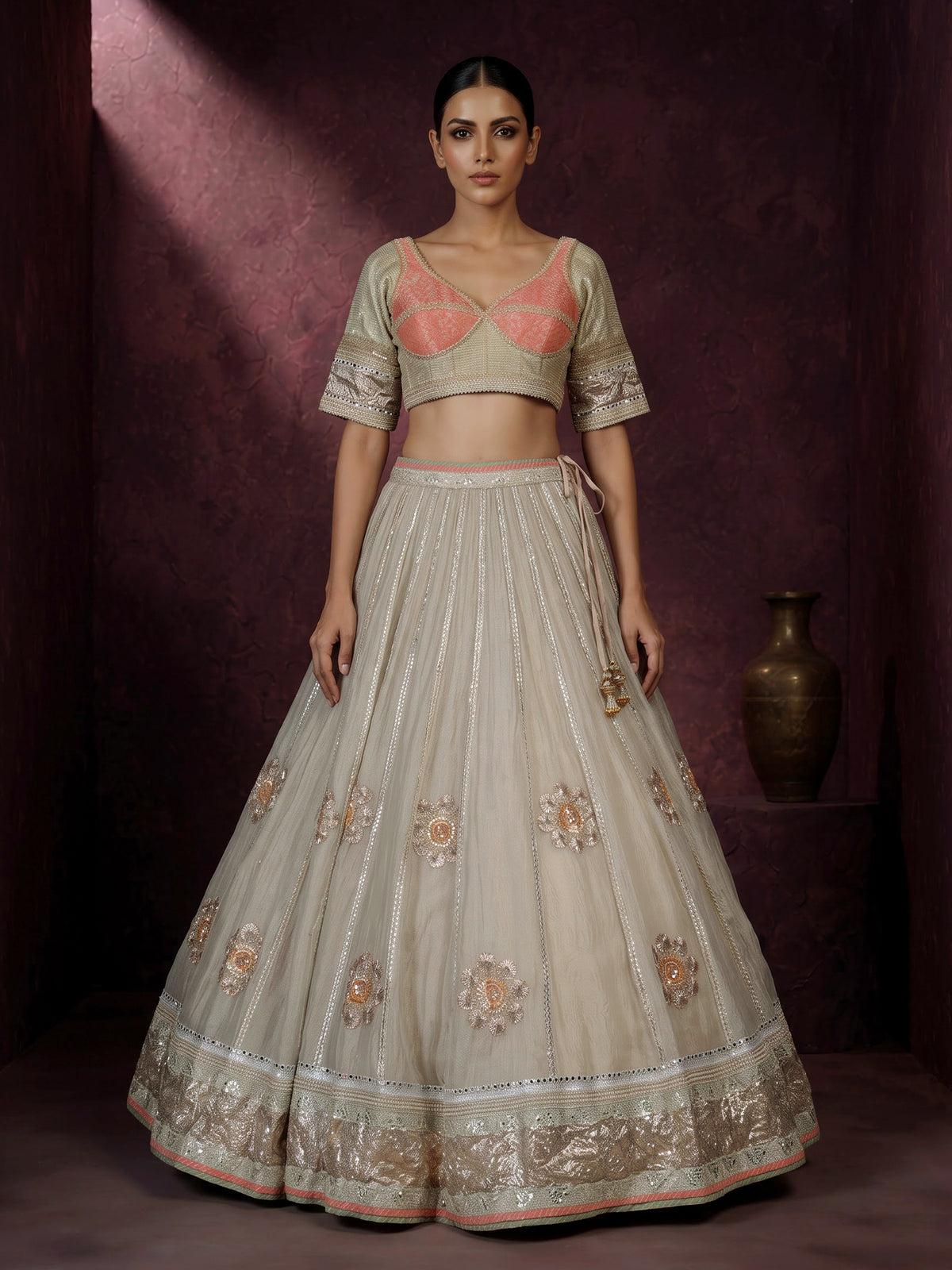 Pastel beige tissue lehenga choli with contrast dupatta embellishments