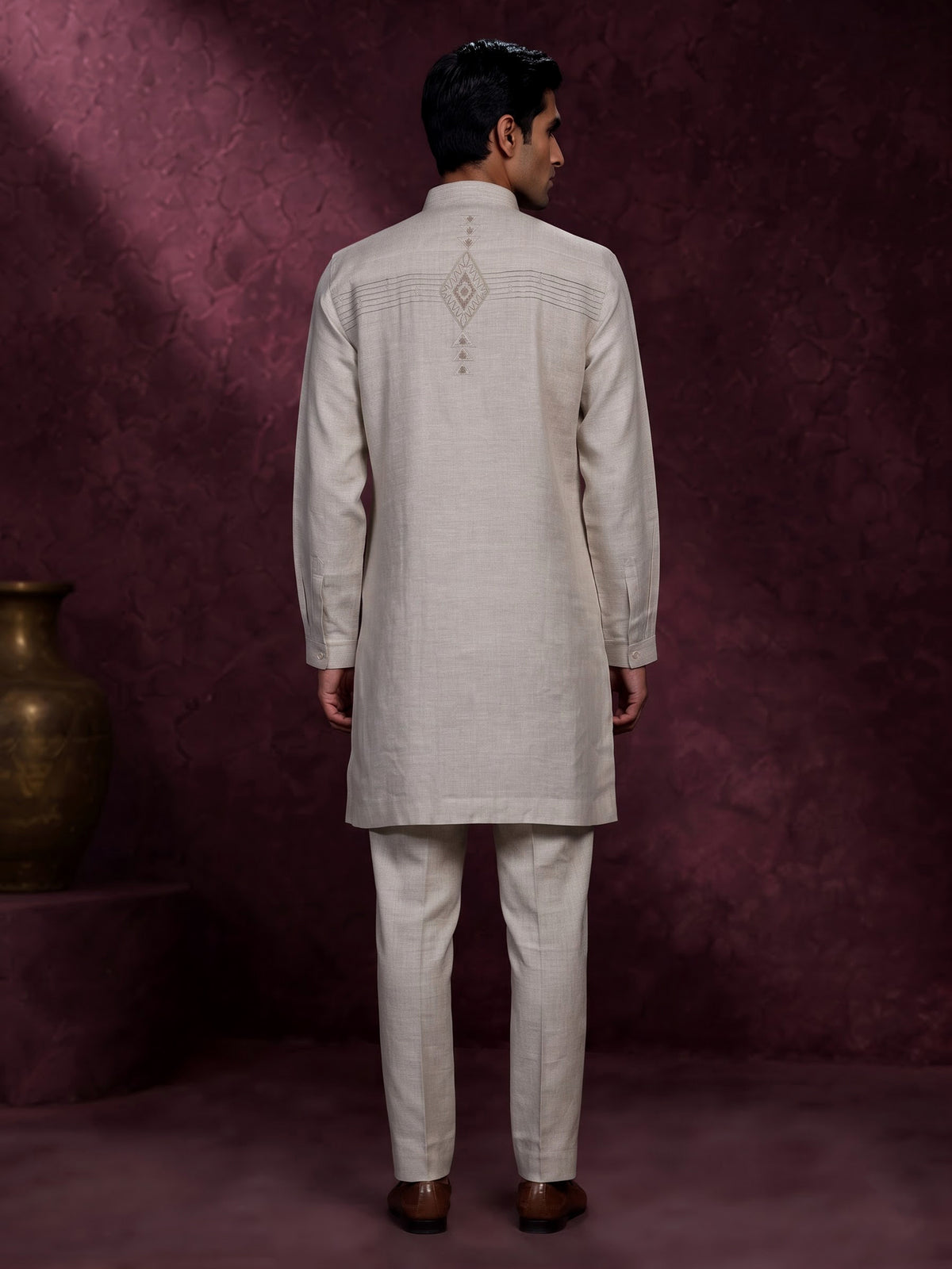 Fawn beige linen kurta suit with geometric chevron embroidered detailing