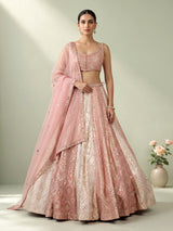 Peach silk lehenga choli with exquisite mirror zari embellishments
