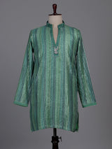 Emerald green kurta suit with shimmering silver gota patti stripes