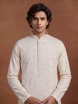 Ivory white lucknowi embroidered kurta suit with subtle bead work