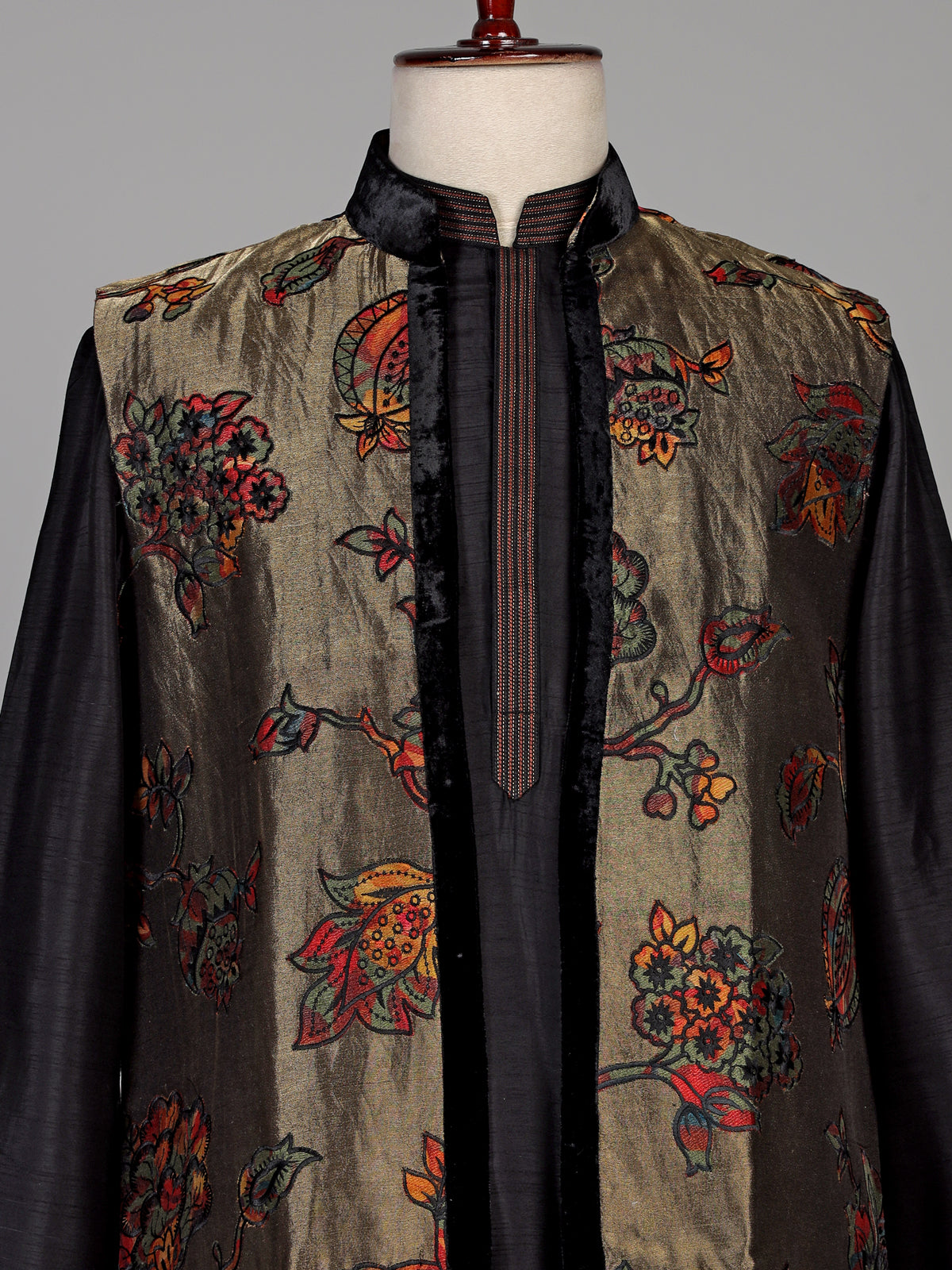 Black raw silk waistcoat set with antique gold floral brocade