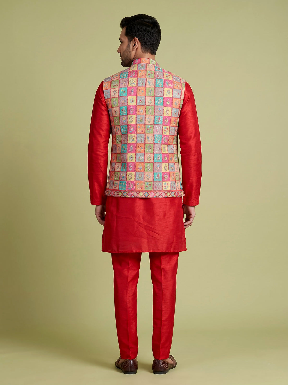 Deep magenta silk waistcoat set with floral texture and sequins
