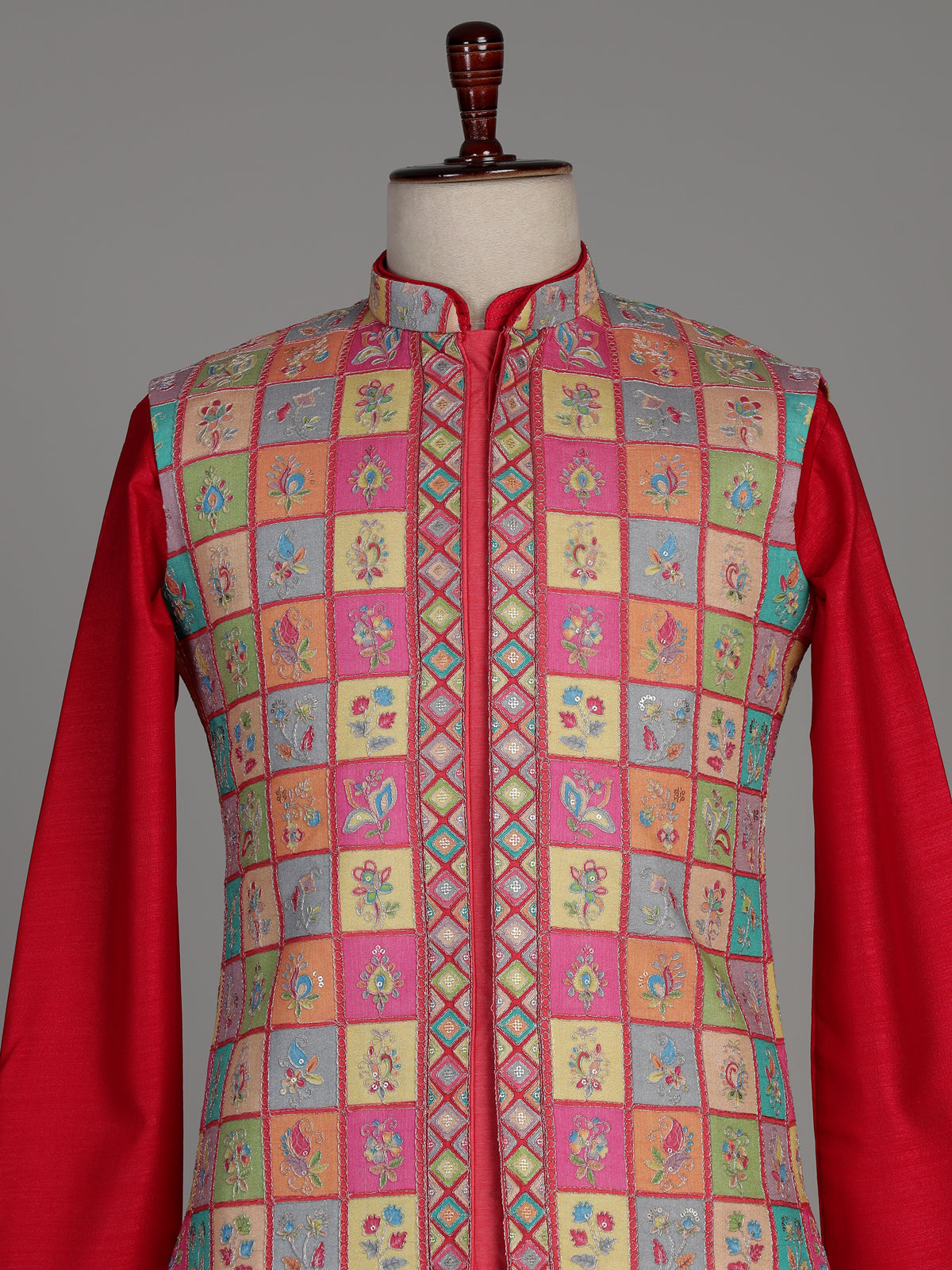 Deep magenta silk waistcoat set with floral texture and sequins