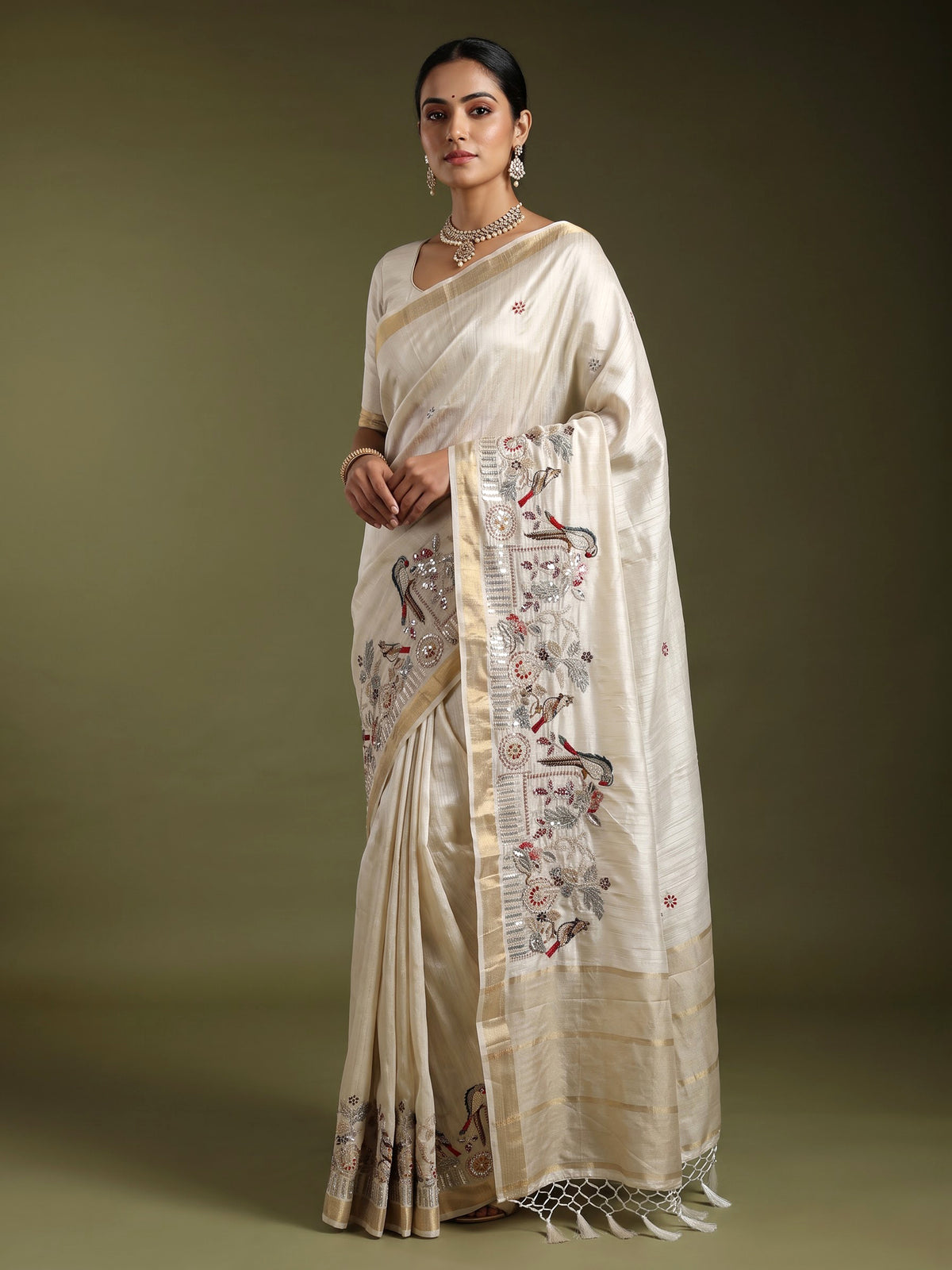 White semi cotton silk saree with embellished bird motifs and tasselled pallu