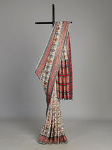 Cream modal satin saree with colourful motifs and intricate zari embellishments