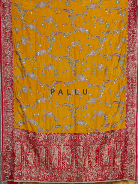 Mustard yellow pashmina saree with floral embroidery and contrast pallu