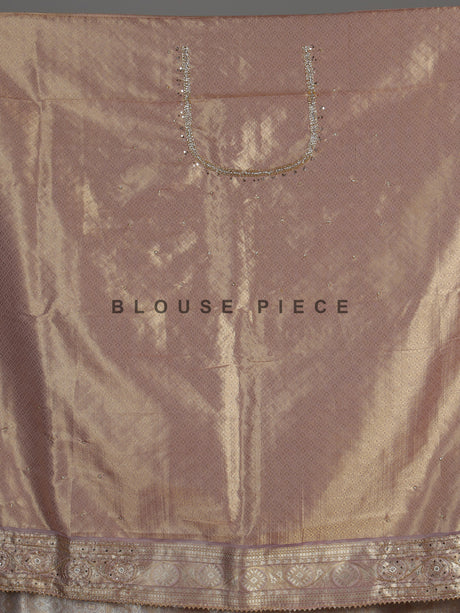 Lavender purple tissue silk saree with detailed zardosi and zari embellishments