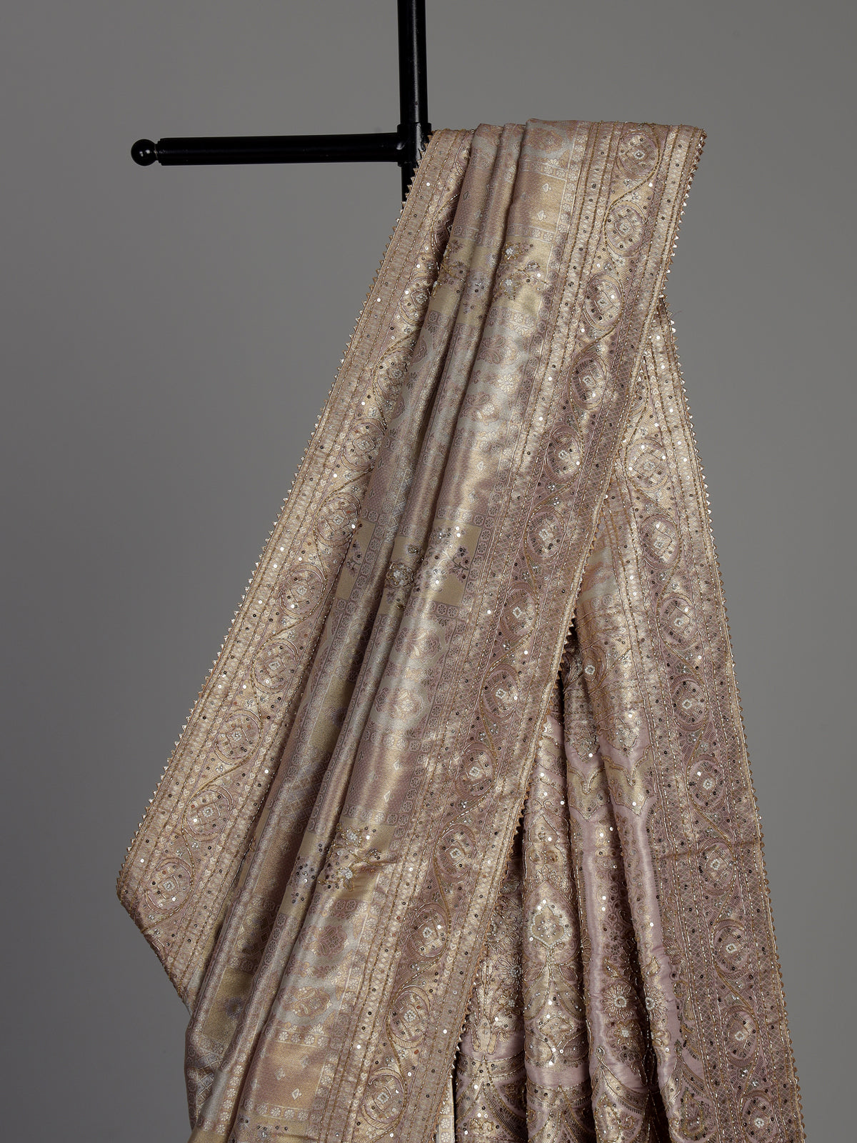Lavender purple tissue silk saree with detailed zardosi and zari embellishments