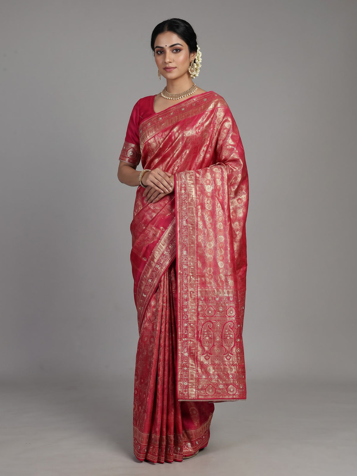 Rani pink tissue silk saree with ornate mirror and zardosi embellishments