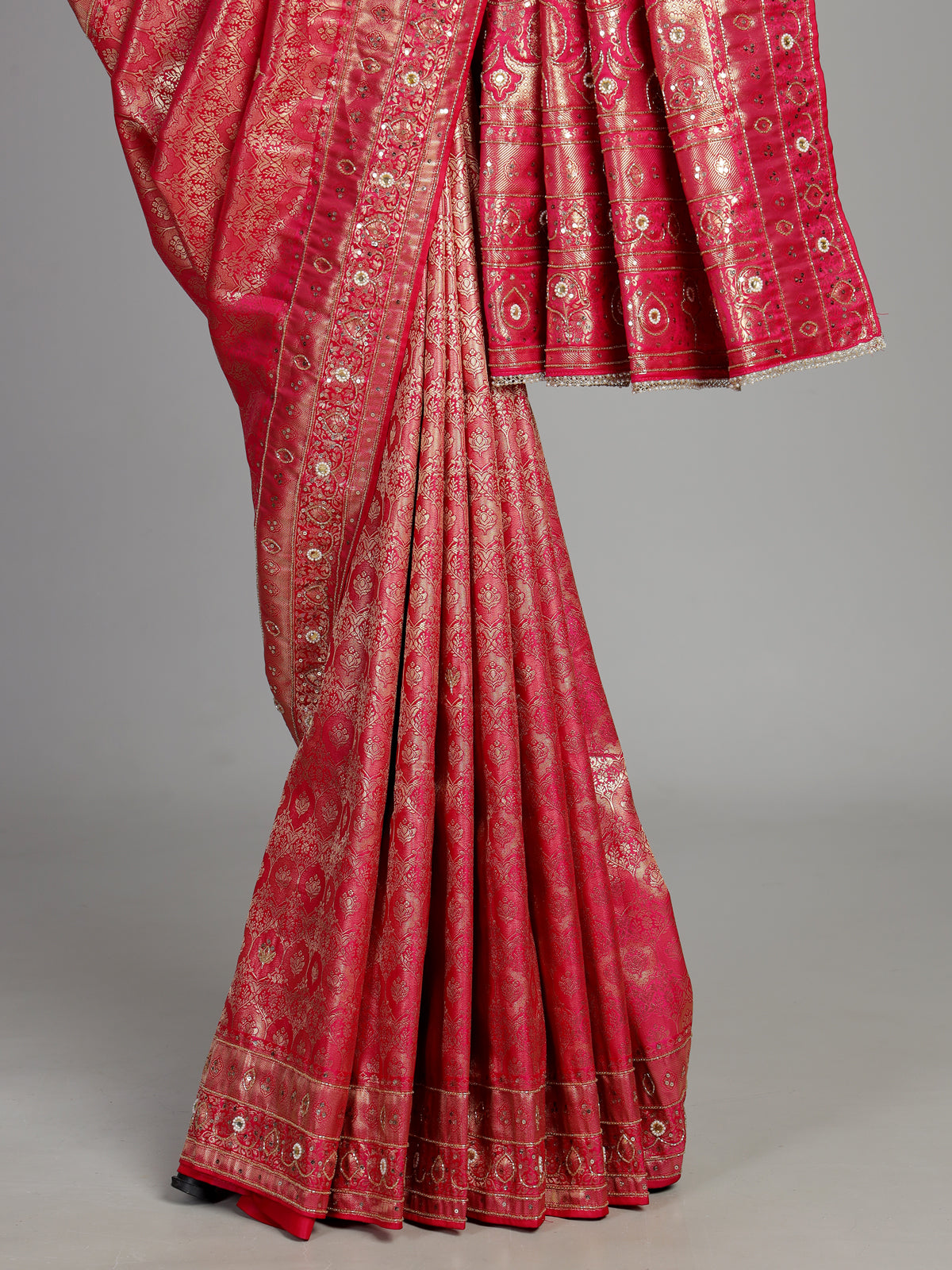 Rani pink tissue silk saree with ornate mirror and zardosi embellishments