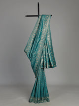 Aqua kanjivaram silk saree with ornate mirror work and zari accents