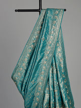 Aqua kanjivaram silk saree with ornate mirror work and zari accents