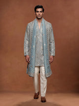 Pastel mint blue silk kurta set with embellished swirl embroidery