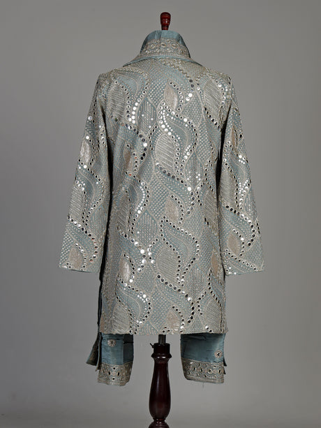 Pastel mint blue silk kurta set with embellished swirl embroidery