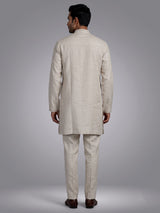 Beige cotton linen kurta set with tonal panels and stonework