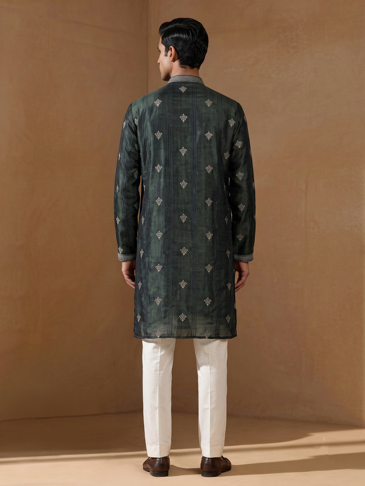 Forest green silk blend kurta set with antique silver detailing
