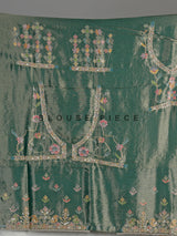 Pastel mint green pashmina saree with floral and bird embroidery