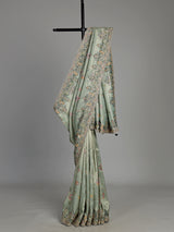 Pastel mint green pashmina saree with floral and bird embroidery