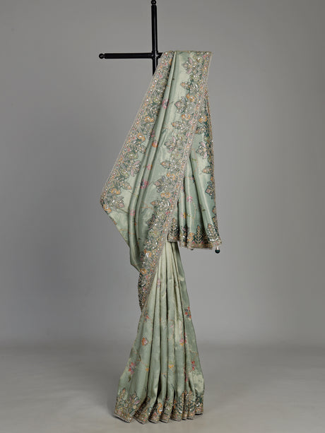 Pastel mint green pashmina saree with floral and bird embroidery