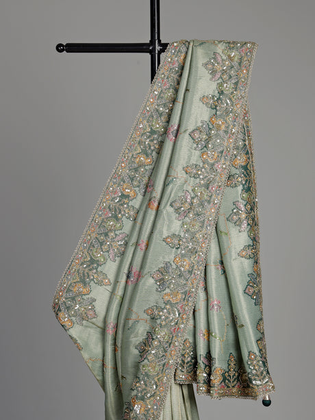 Pastel mint green pashmina saree with floral and bird embroidery