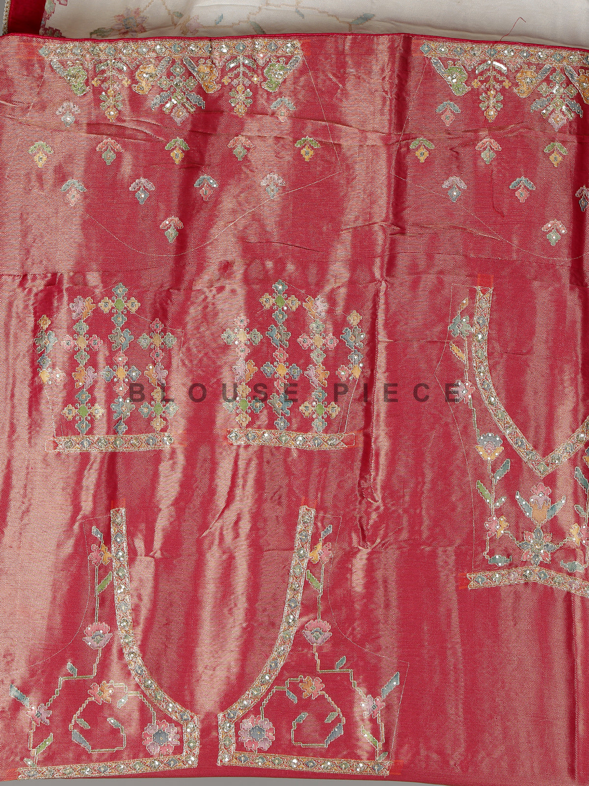 Cream pojisan silk saree with floral motifs and ornate zardosi embroidery