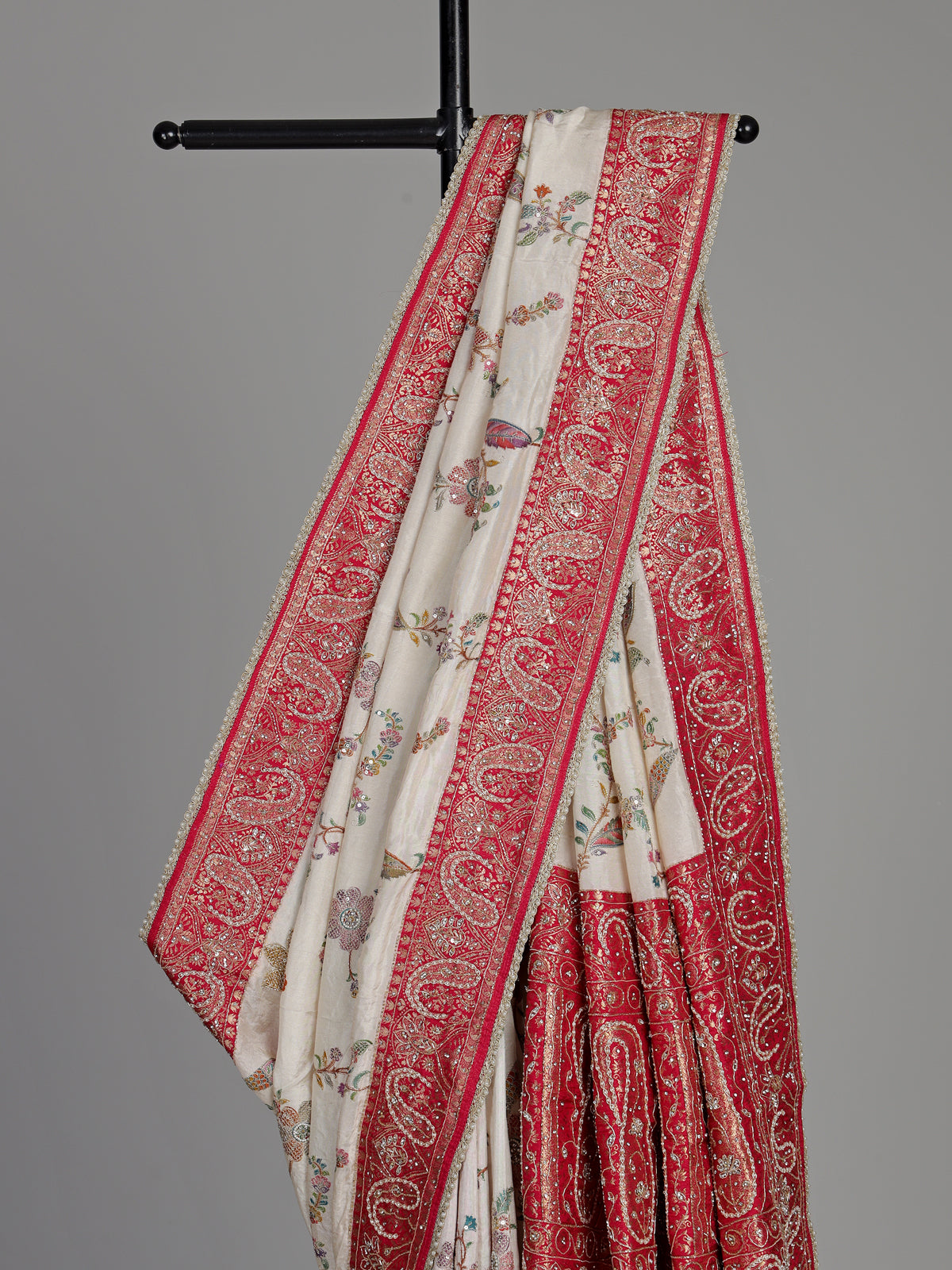 Cream pashmina saree with floral embroidery and diamond embellishments