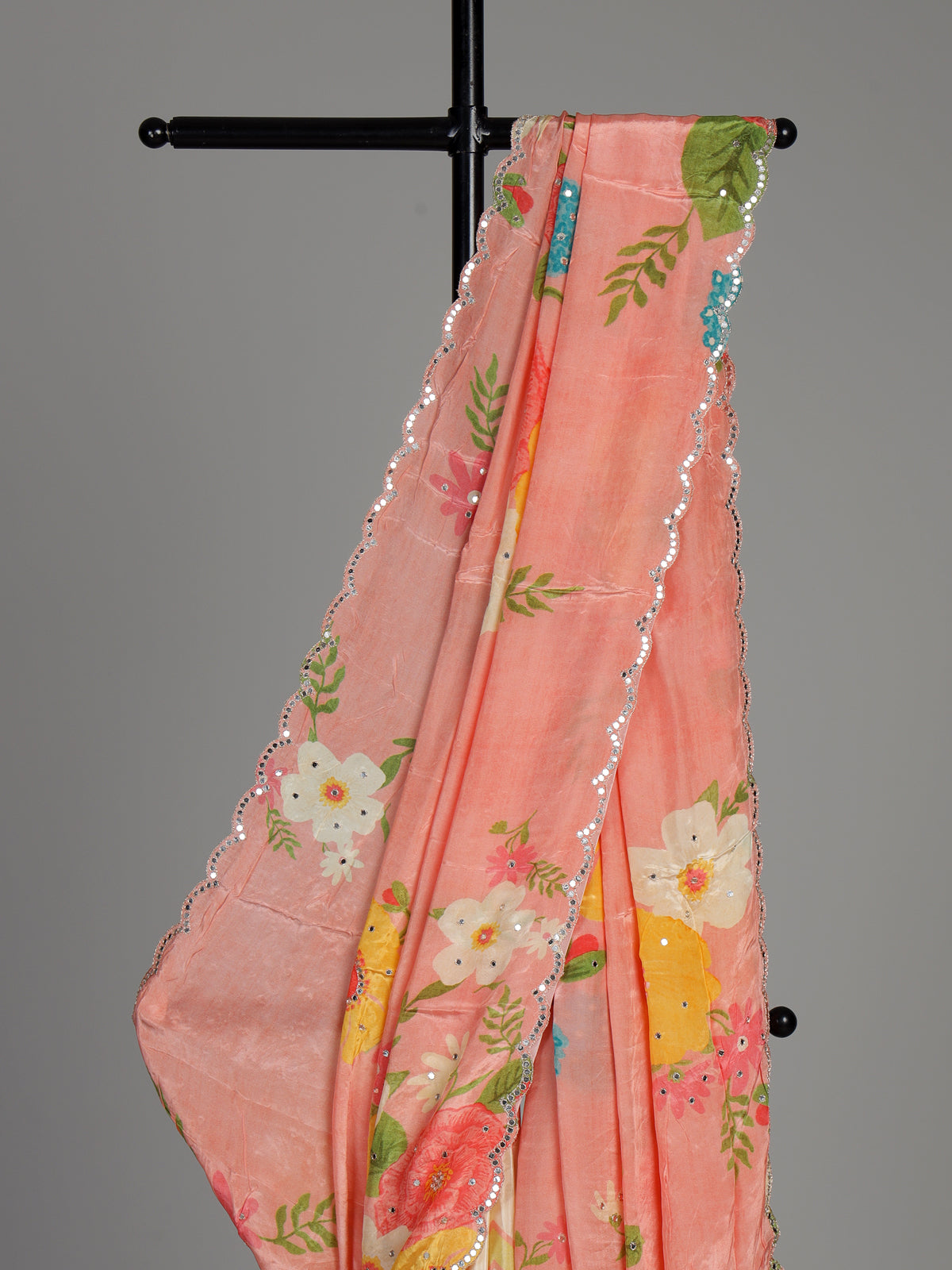 Peach crepe silk saree with floral prints and delicate aabla work