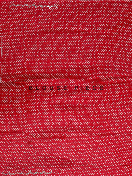 Red muslin silk saree with bandhani print and traditional aabla embellishments