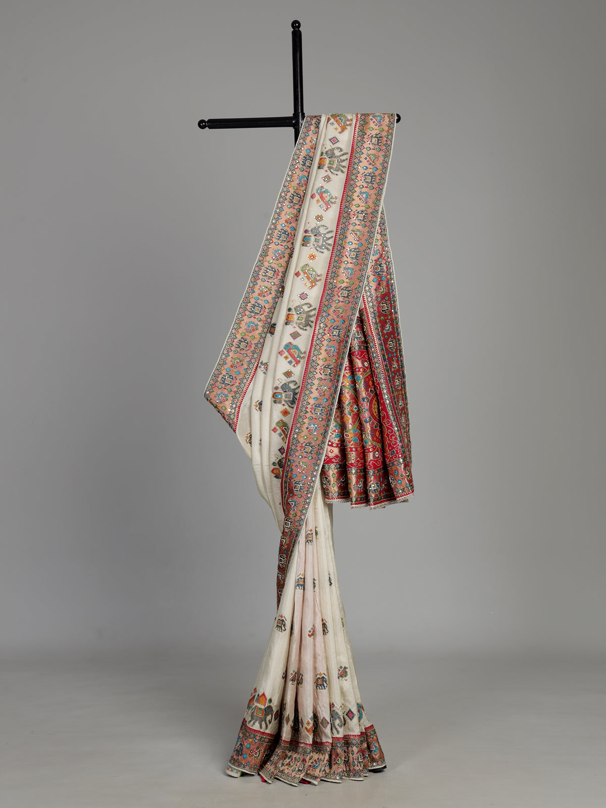 Cream pashmina saree with elephant and bird motifs and zari