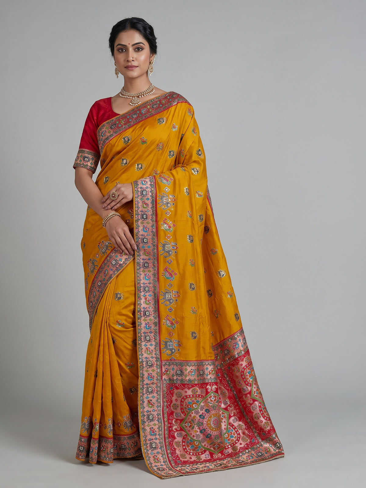 Mustard yellow pashmina saree with elephant motifs and contrasting pallu