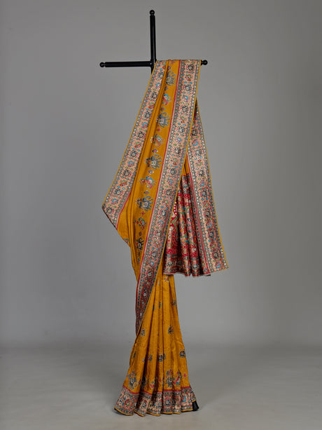 Mustard yellow pashmina saree with elephant motifs and contrasting pallu