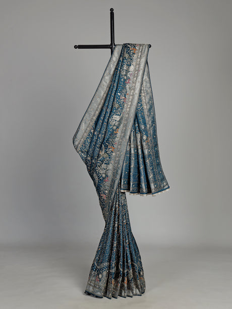 Teal blue semi silk saree with artistic animal and bird motifs