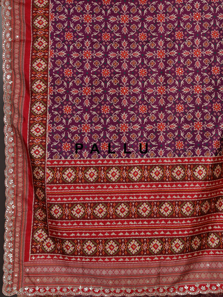 Purple semi patola silk saree with Patola print and contrasting embellished pallu