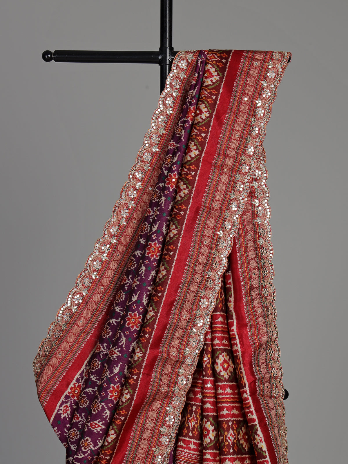 Purple semi patola silk saree with Patola print and contrasting embellished pallu