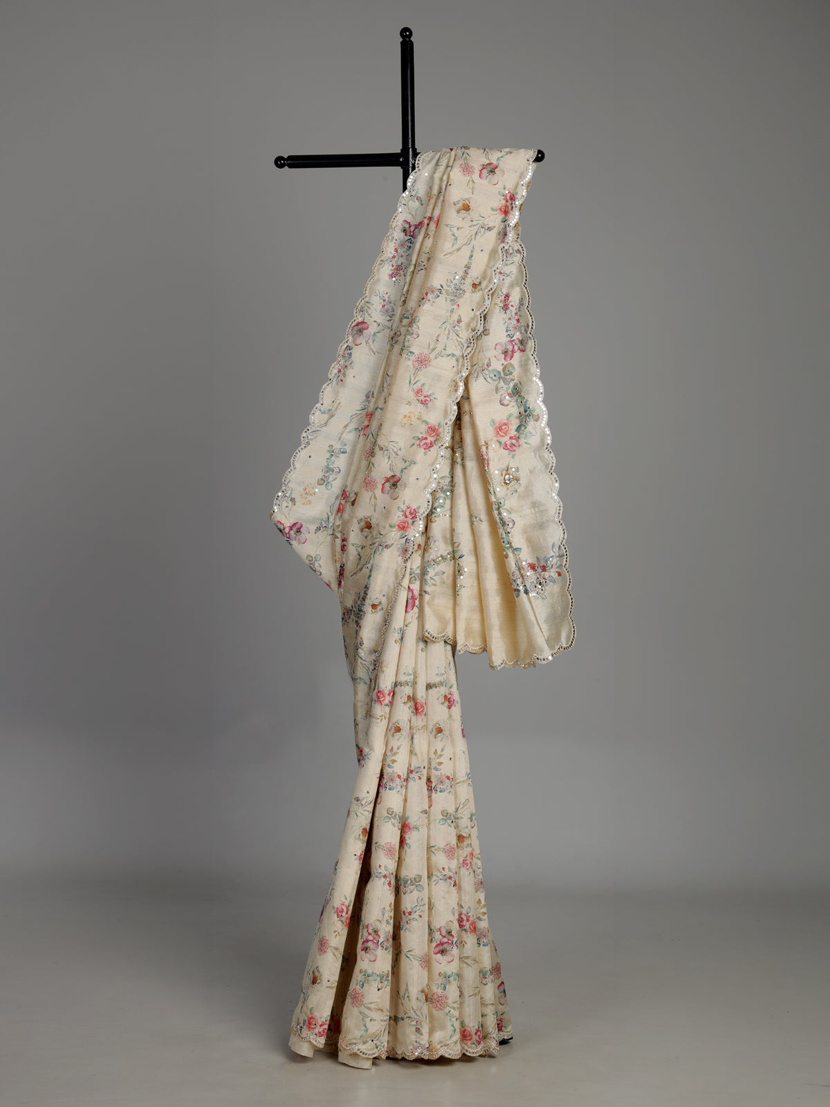 Cream tusser silk saree with floral prints and embellished beadwork