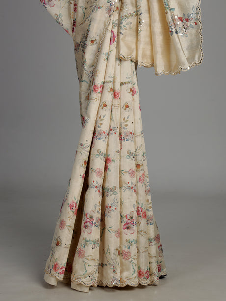 Cream tusser silk saree with floral prints and embellished beadwork