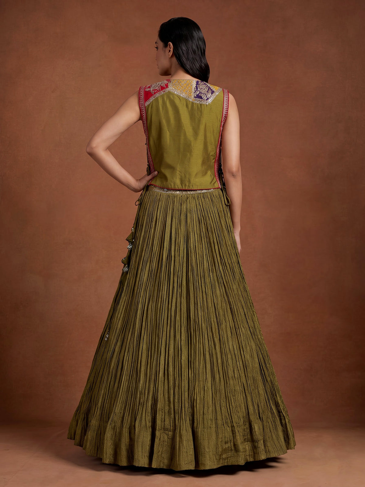 Mehendi green silk lehenga choli set with intricate festive embellishments