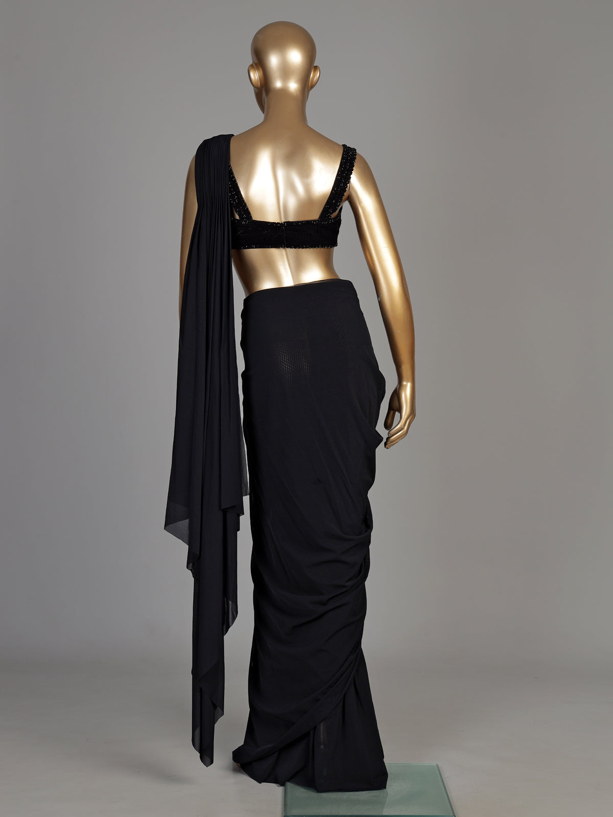 Black georgette ready-to-wear saree with pearl tassel blouse