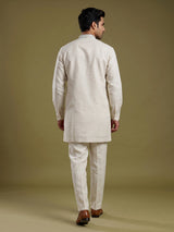 Cream cotton linen kurta suit with pastel embroidered yoke for mens