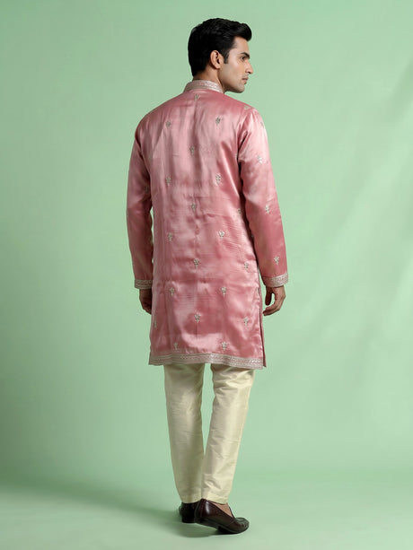 Pastel pink Dupion silk kurta suit with heavy zardozi embellishments for mens