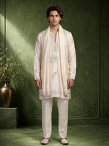 Cream raw silk kurta suit with royal peacock and elephant embroidery for mens