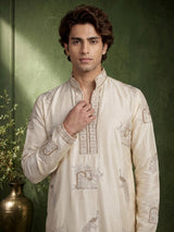 Cream raw silk kurta suit with royal peacock and elephant embroidery for mens