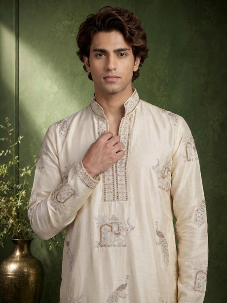 Cream raw silk kurta suit with royal peacock and elephant embroidery for mens