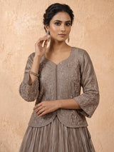 Pastel grey tissue silk lehenga choli with stone and zardosi work