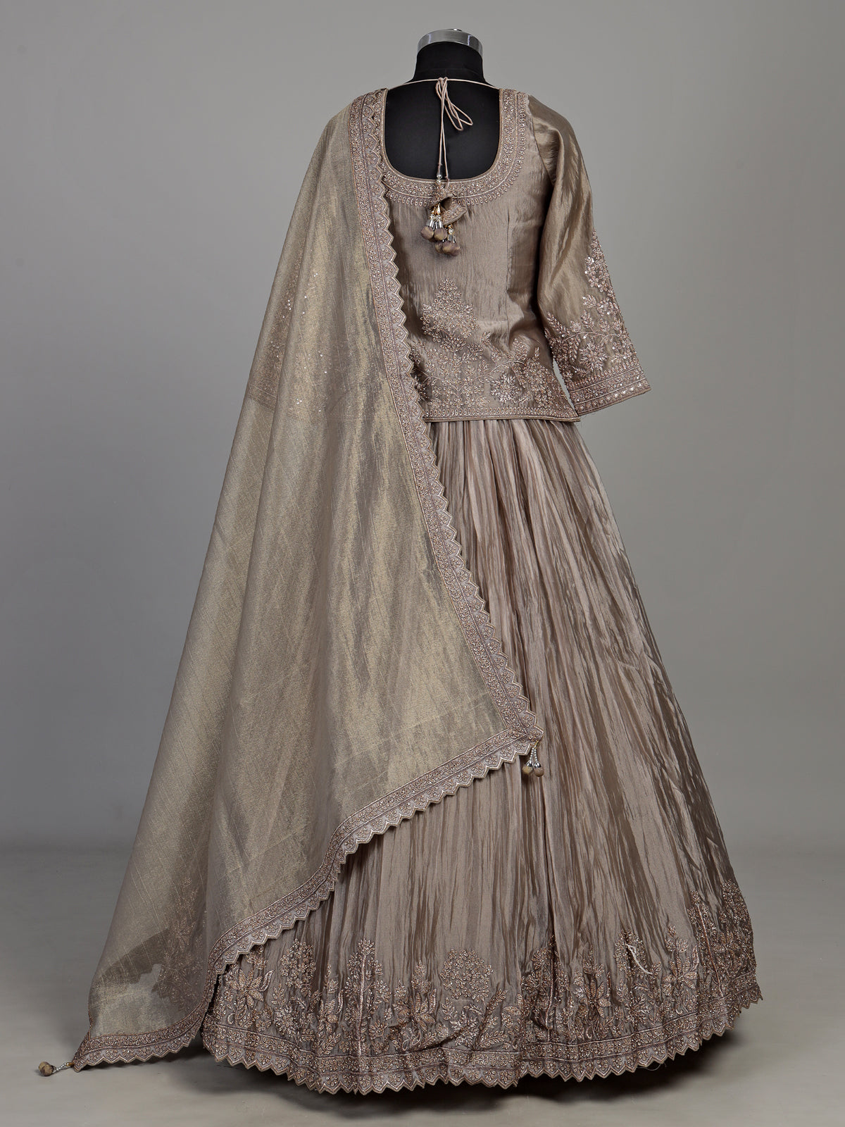 Pastel grey tissue silk lehenga choli with stone and zardosi work